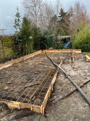 Project betonvloer met gemetselde borstwering